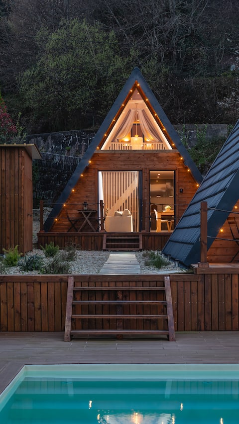 Cabin, pool and partial view