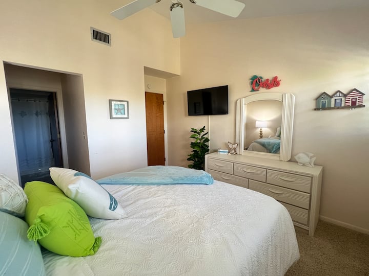Located in bedroom 2.  Queen size bed, full bathroom and smart tv.