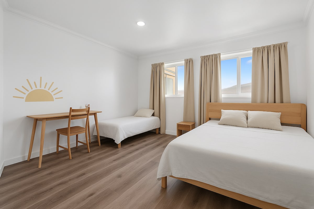 Second bedroom with queen and twin bed plus work desk in San Diego mid-term rental