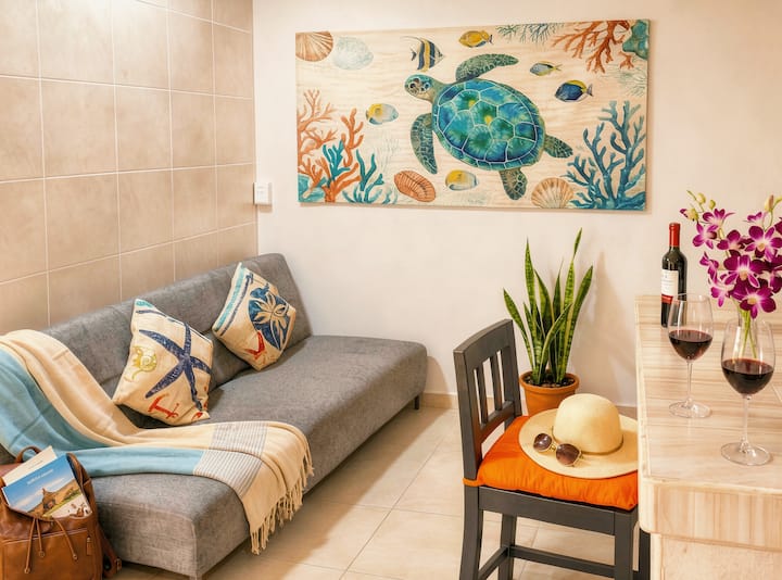 Stretch out on the spacious matrimonial sofa bed for movie nights on the 32” HDTV with Netflix, Disney+, Apple TV, and Prime ready to connect, or enjoy a peaceful, efficient workspace between beach adventures.
