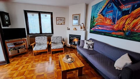 The house in the woods in Casasco with lake view