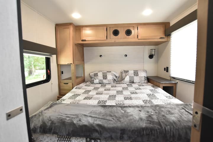 Private bedroom with queen sized bed.