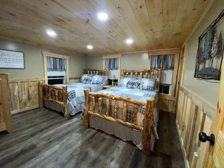 Upstairs Bedroom 2 full beds, pack and play located in closet.