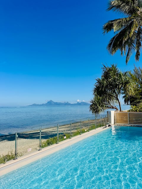 Modern 2-bedroom villa with pool and beachfront