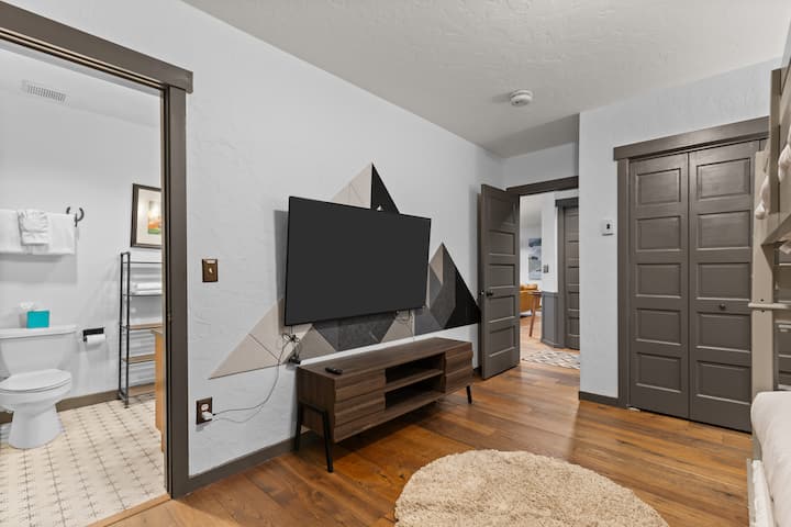 Large smart tv for bedroom 4 and the entrance to the shared bath. 