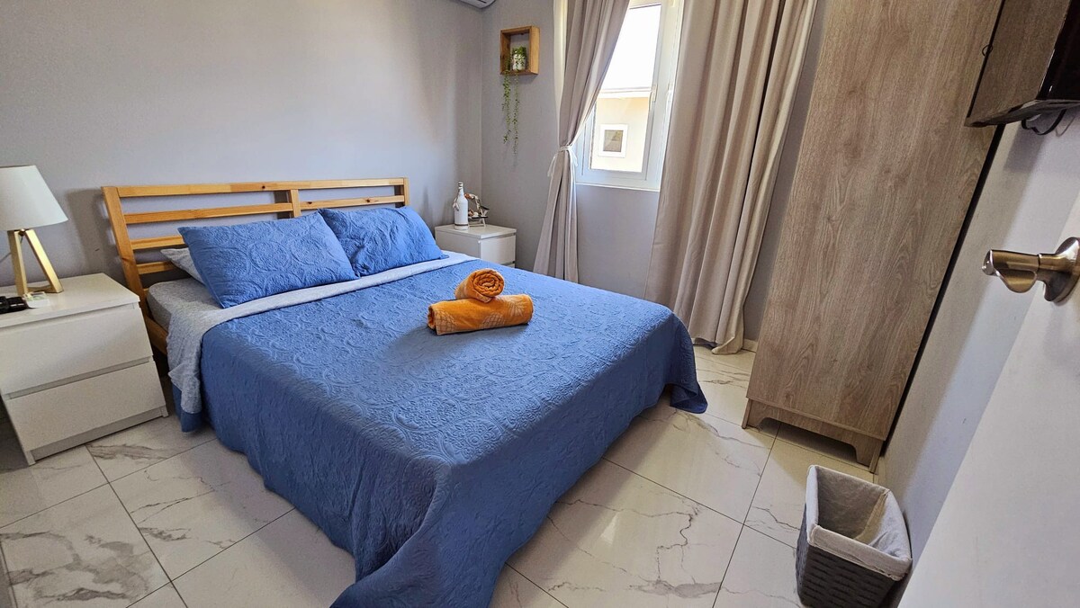 Our second bedroom has a Queen bed, airconditioning and a smart TV