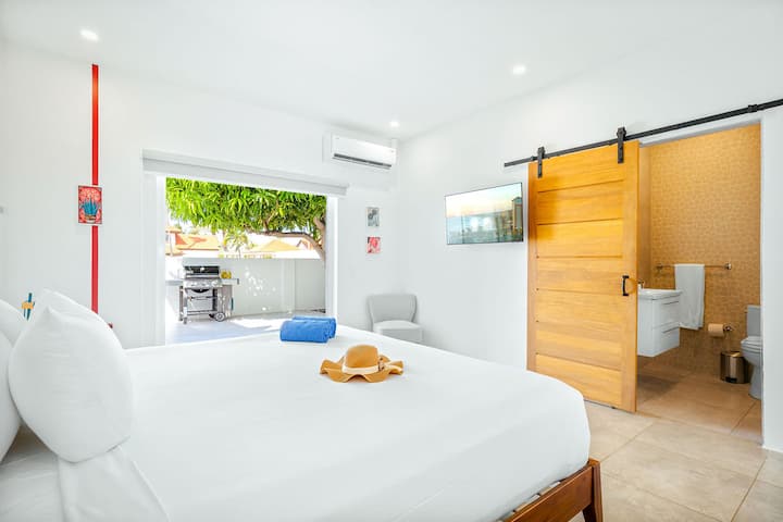 Bedroom 7: Sink into serenity in our cozy bed, where every moment is a dream wrapped in comfort. Welcome to your haven of tranquility, where relaxation knows no bounds.