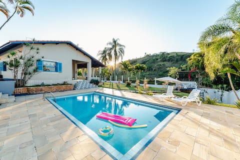 Lakefront house with pool and barbecue area