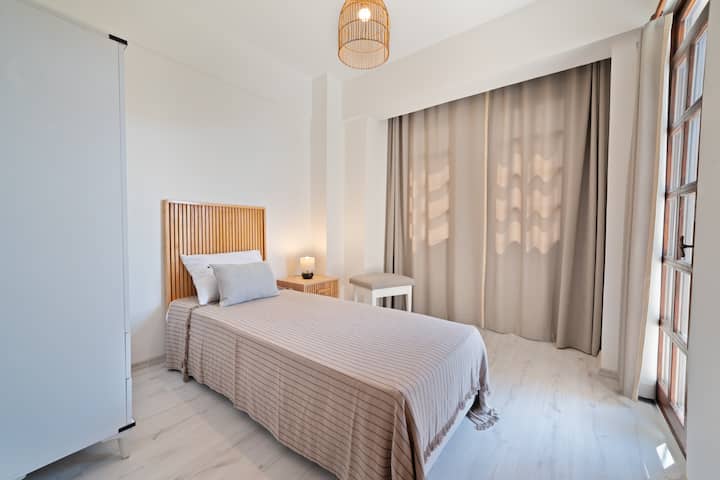 Acogedor dormitorio individual