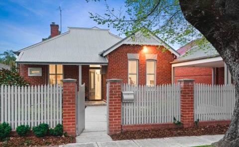Absolute Central 4 BR 2.5 Bath Red Brick Home