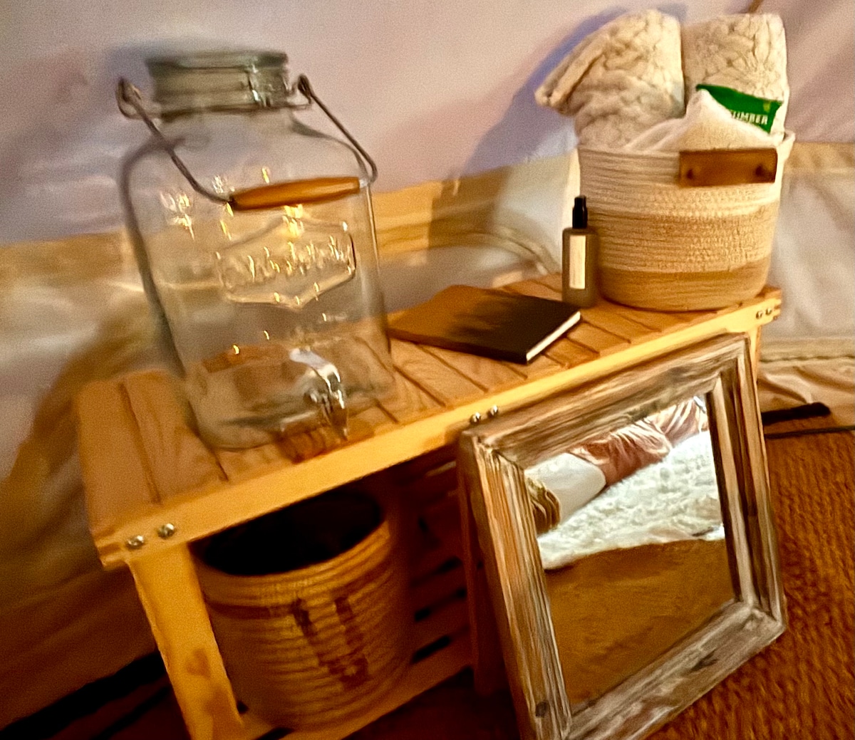 For you: Eco Bamboo Shoe rack with cotton towels, mirror, trash can, fresh water filtered from our well. Need anything else? Just ask. at Bohemian Belle Yurt in Hidden Valley Lake