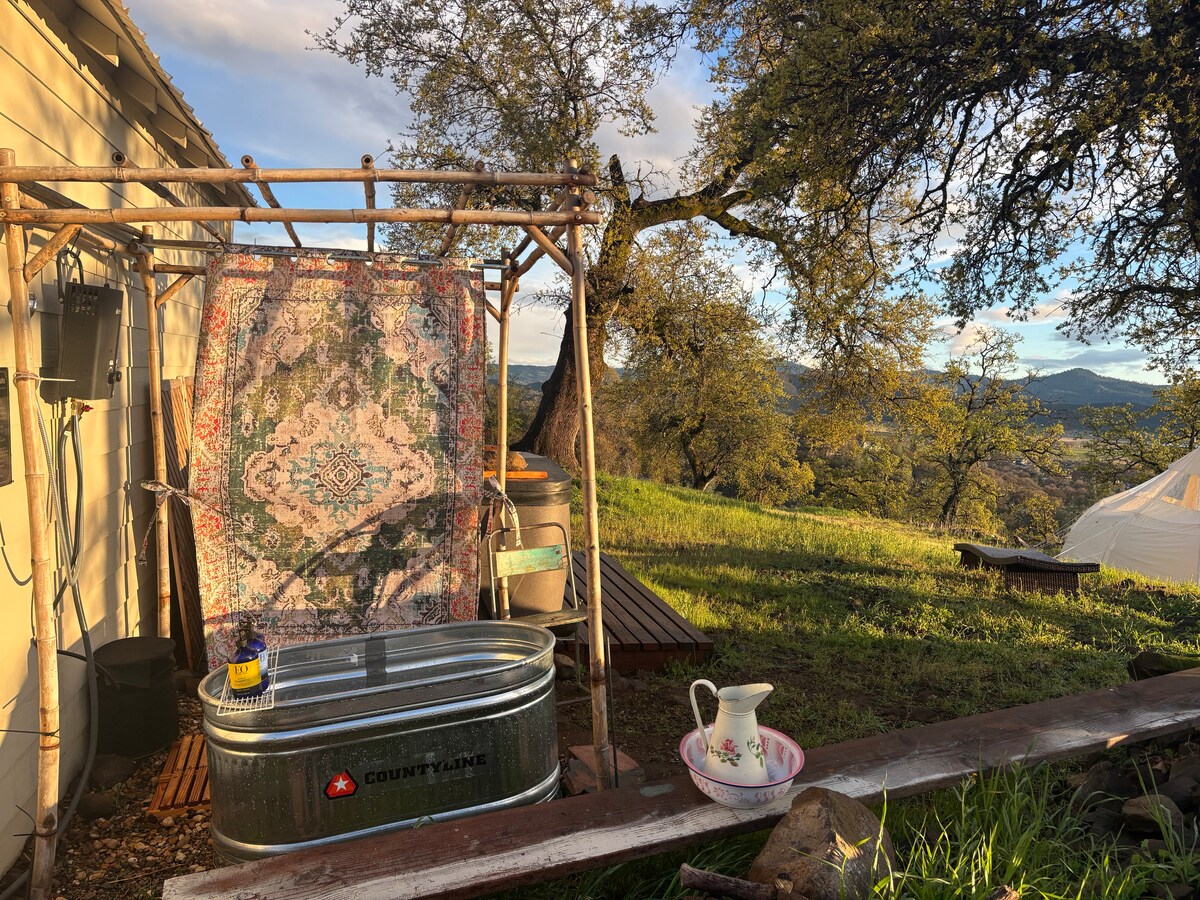 Take a cold plunge or hot soak in our "Hillbilly hot tub," (100 gallon) perfect for one or two. Fill it with hot water from our on demand hot water heater and soak outside. Or fill