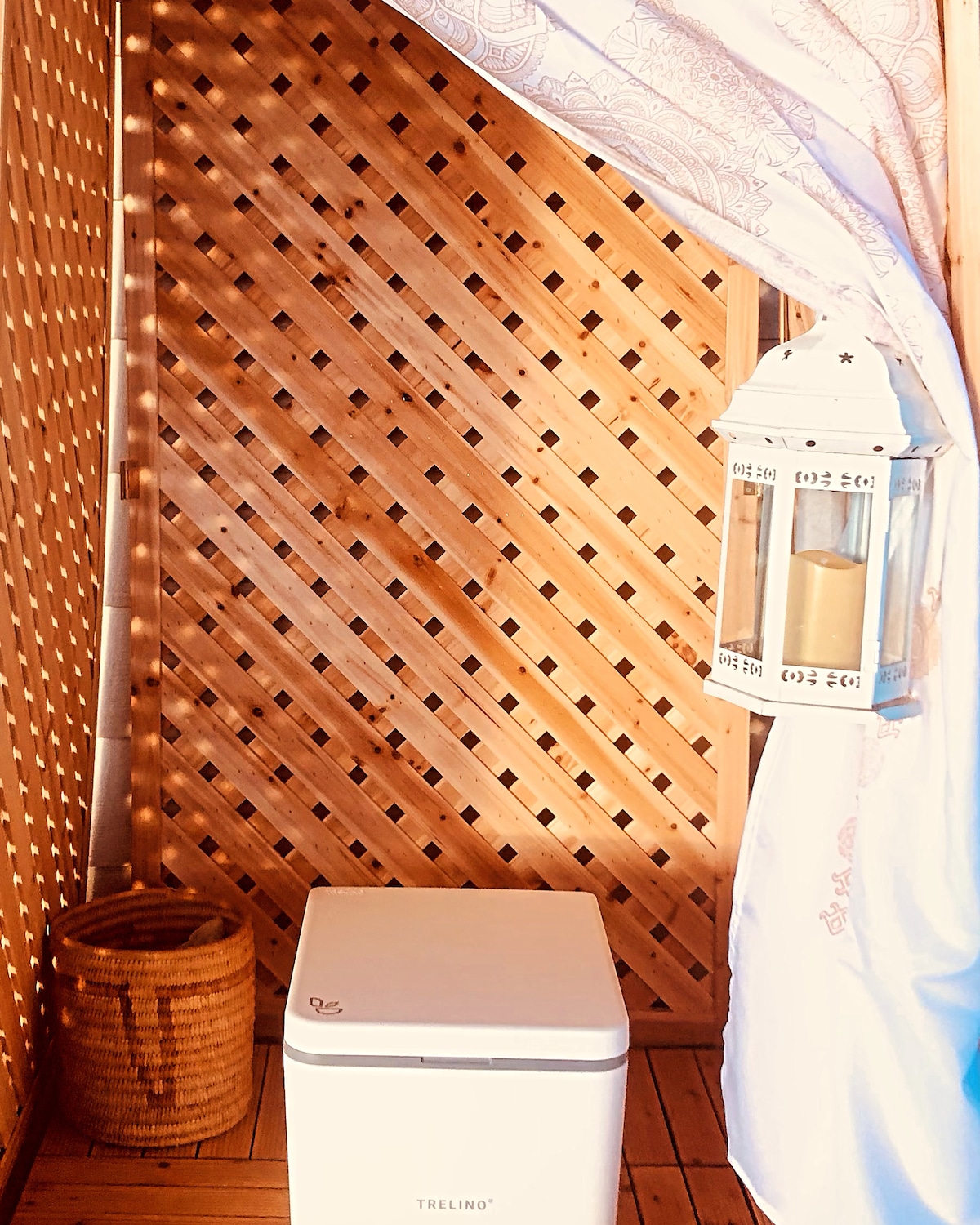 We added a modern Trellino German composting toilet ($600 best made on Earth). The structure may look different than this due to weather conditions and wind. at Bohemian Belle Yurt