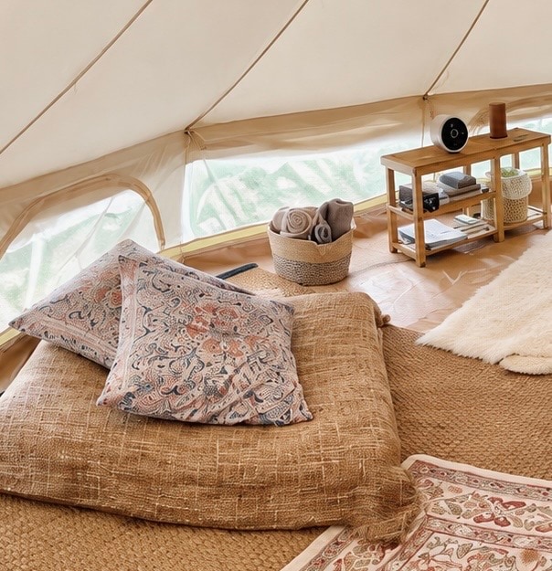 Floor cushion converts to twin bed for extra guest. Linens are in the blanket chest. at Bohemian Belle Yurt in Hidden Valley Lake