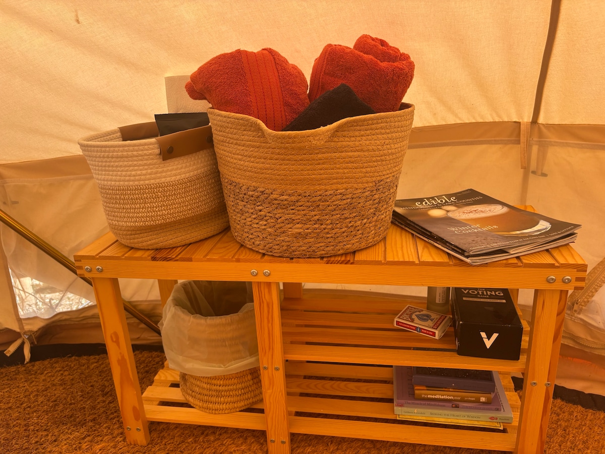 Towel baskets and clening basket, trash, games/cards, books, local guides, shoe rack for your shoes. (Nice to bring slippers.) at Bohemian Belle Yurt in Hidden Valley Lake