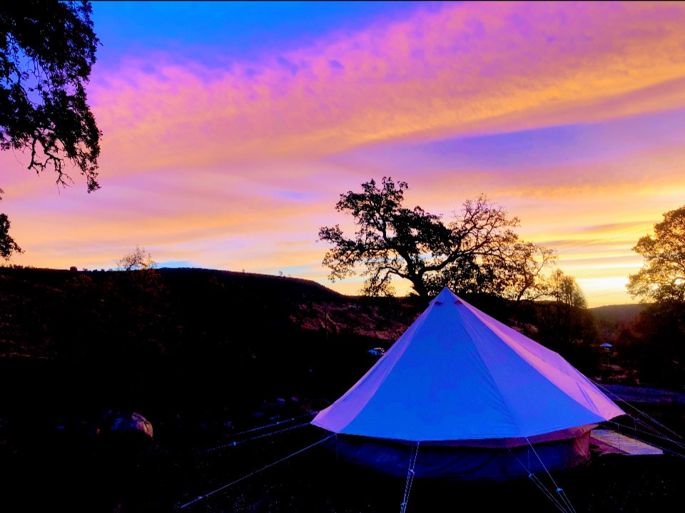Winter Sunrise over the yurt. Surreal. You can imagine primitive ancestors living here. This area has been inhabited by humans longer then Egypt. at Bohemian Belle Yurt in Hidden V