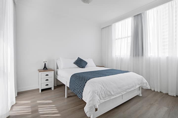 The 3rd bedroom features a queen sized bed, luggage rack and ample storage, with both block out and sheer curtains to customise your environment.