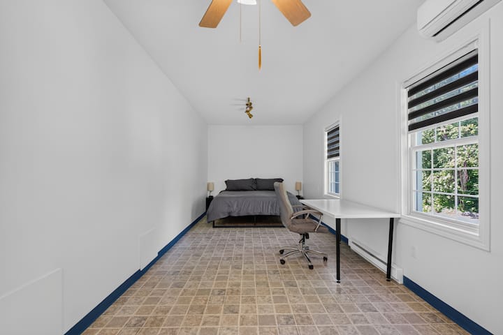 King size bed with a working space