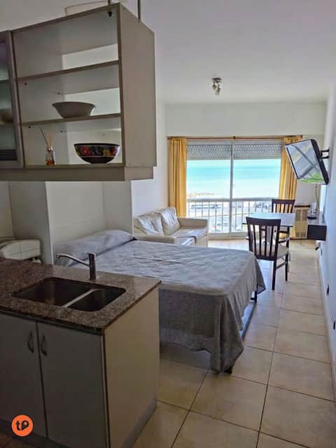Oceanfront, with a shell collection. Comfortable and bright.