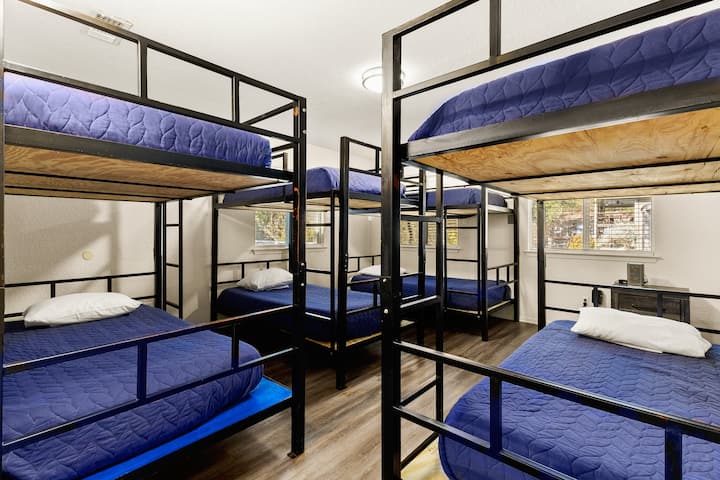 This fun bunk room sleeps a crowd with sturdy bunks and plenty of space, perfect for families, groups, or getaway weekends near the river.