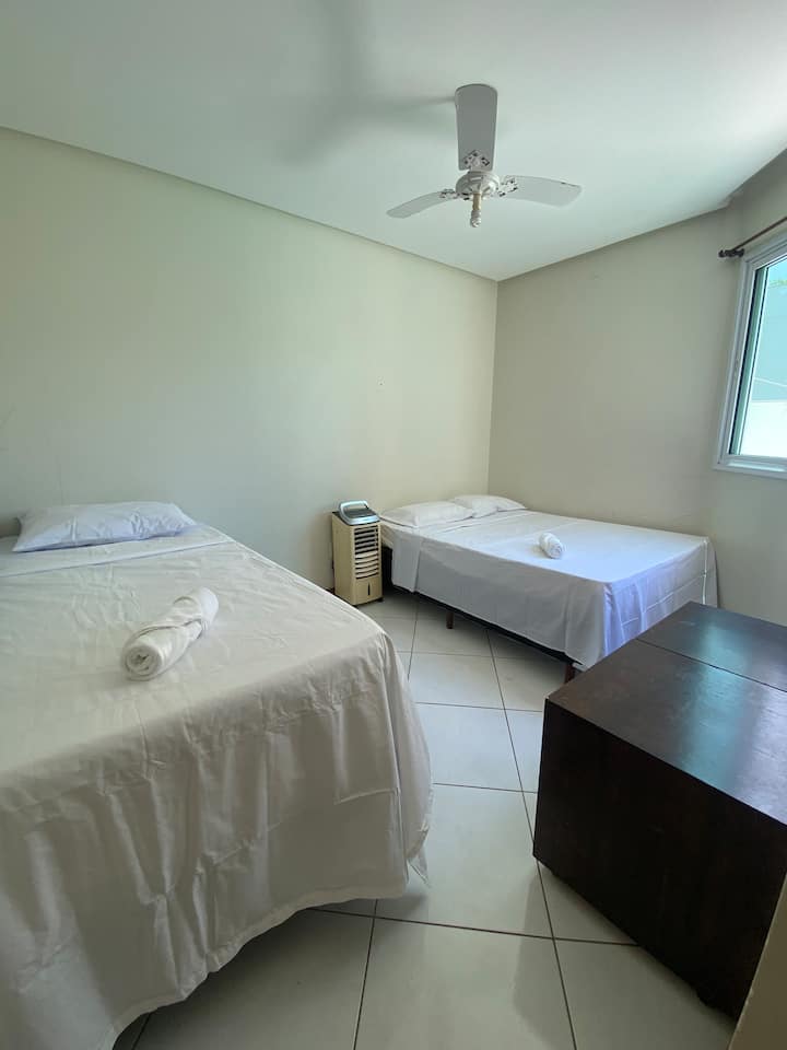 Second bedroom with a double bed and a double bed.