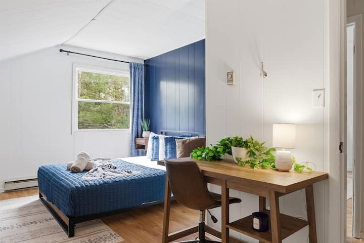 Bedroom 3 ️ — a comfortable retreat with a dedicated table and chairs, perfect for remote work, studying, or planning your next adventure.