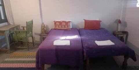 Bodhgaya room in a lush garden .