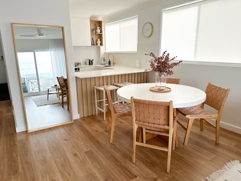 Light filled ocean front apartment