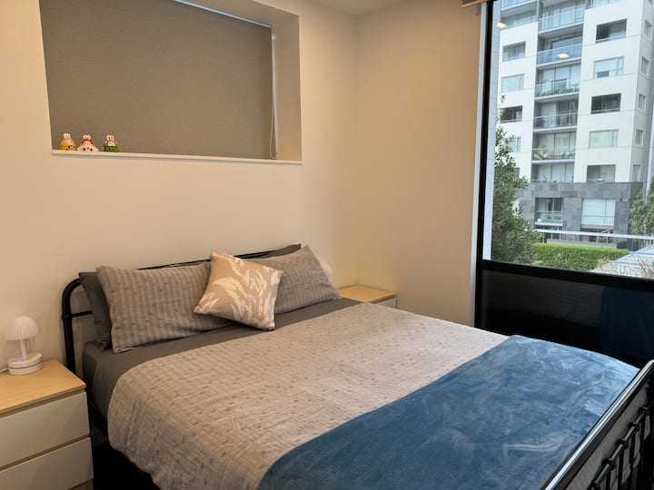 Second bedroom on the 2nd level. queen-sized bed.

We use anti-allergy alternative pillows. Default set is one Soft (for tummy sleepers) and one Medium (for back sleepers) for each guest in bedrooms. 

Two Firm pillows are stored in each wardrobe. 