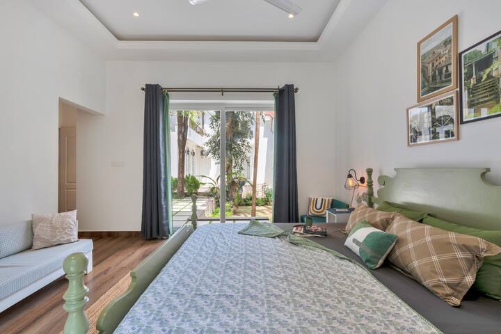 Bedroom 1- King Bed
Tall window overlooking courtyard on one end