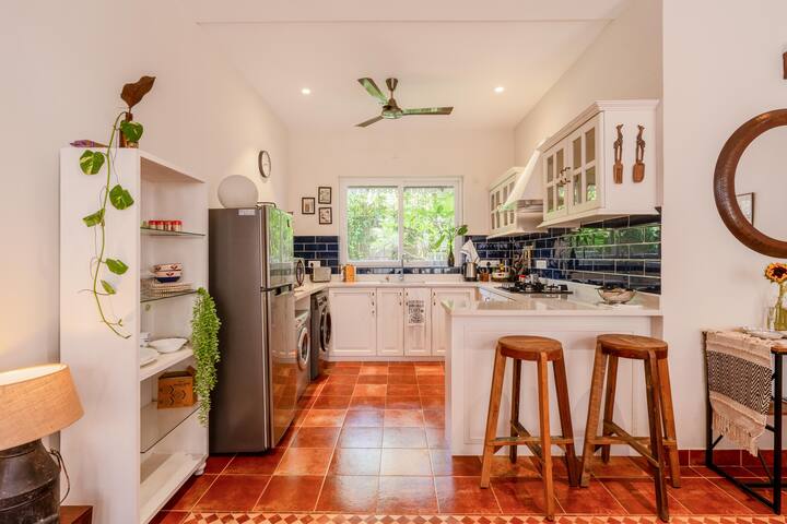 Breakfast counter and kitchen amenities