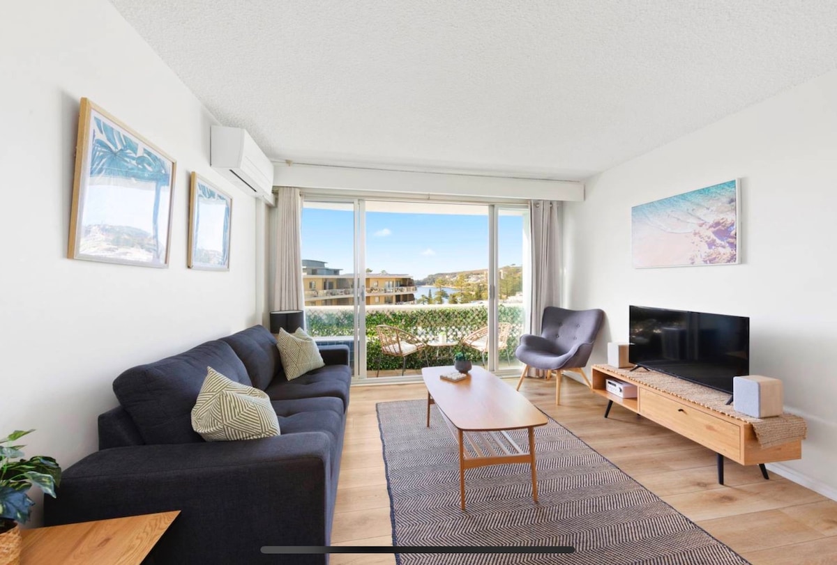 Living space with ocean views and smart tv