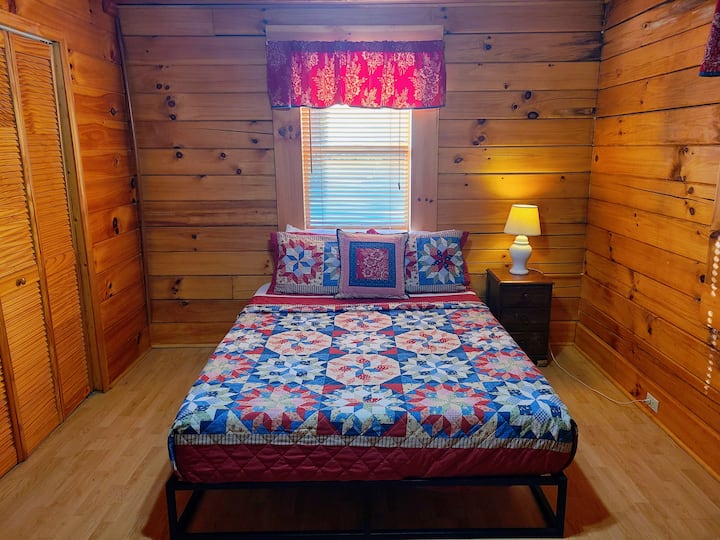 1st Floor - 1st QUEEN BR

Cozy and comfortable with a queen bed, side table with lamp, and drawers for storage, a relaxing space to unwind and recharge.