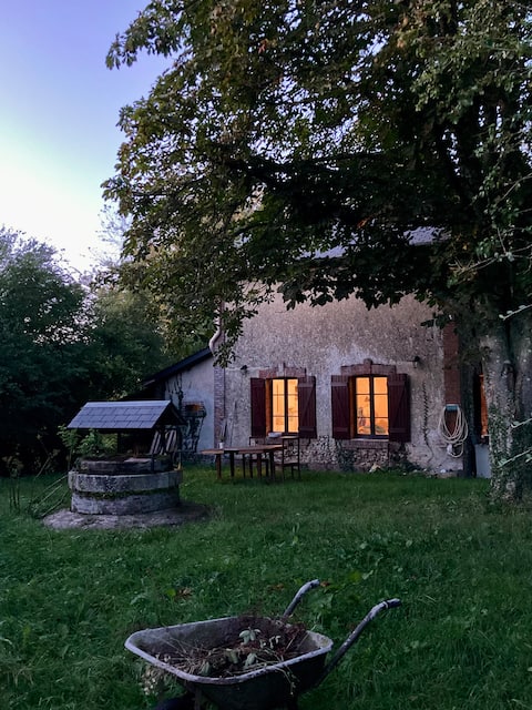 Small country house between river and forest