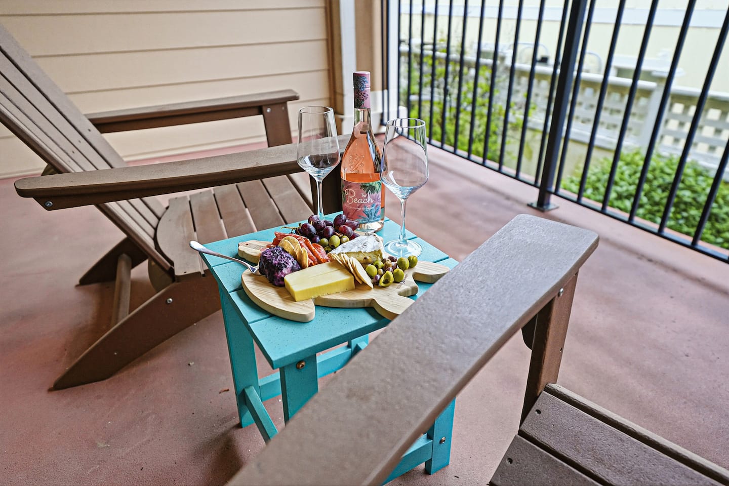Unwind on the master bedroom balcony with cozy seating, fresh ocean air, and a peaceful space for morning coffee or evening drinks.