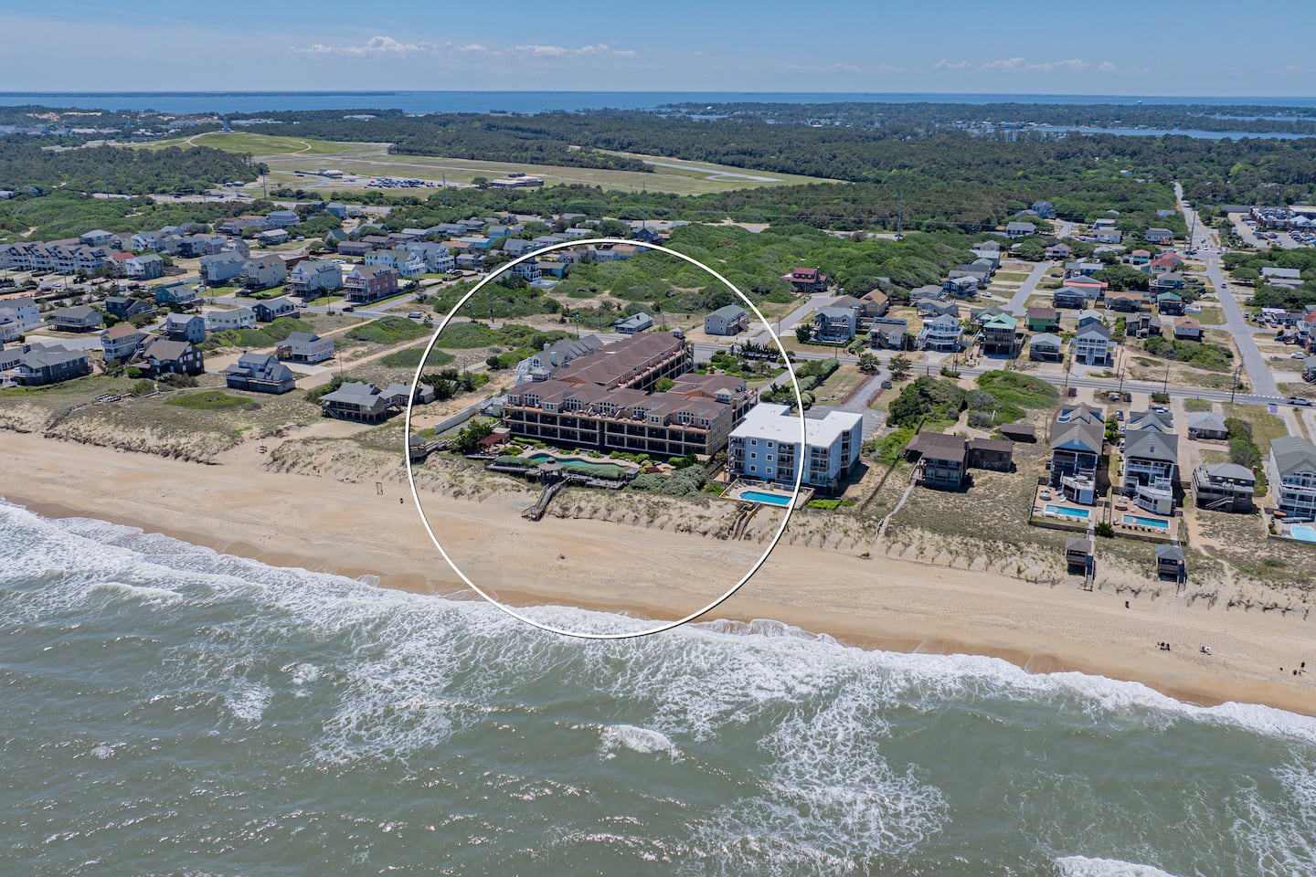 Where mornings start with waves and end with sandy feet.