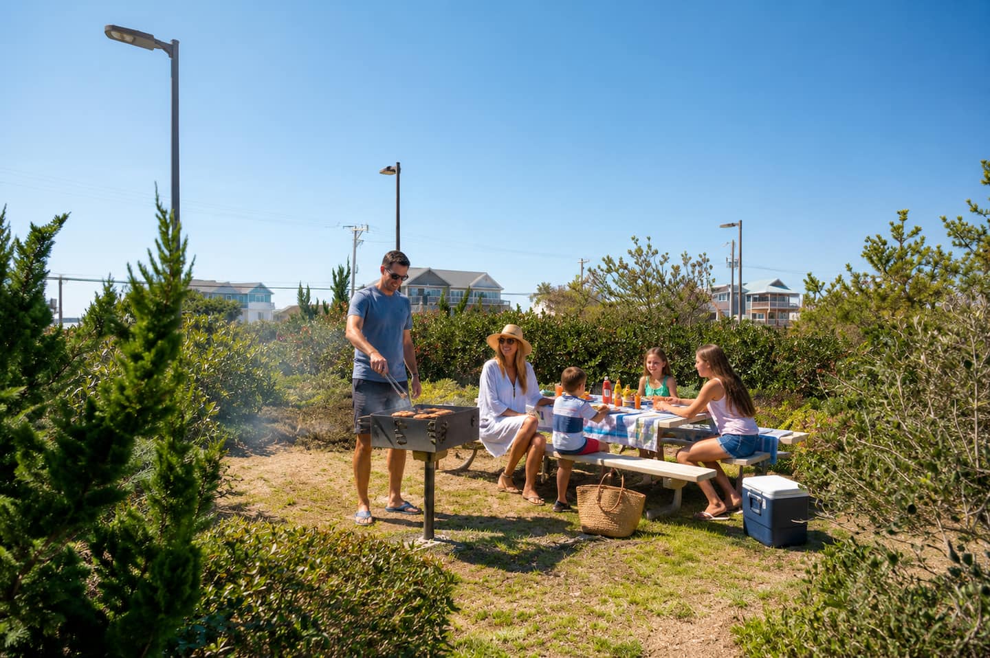 End the perfect beach day with burgers on the grill, laughter around the picnic table, and dinner under the coastal sky. It's the perfect place to gather, reconnect, and make vacation memories together.
