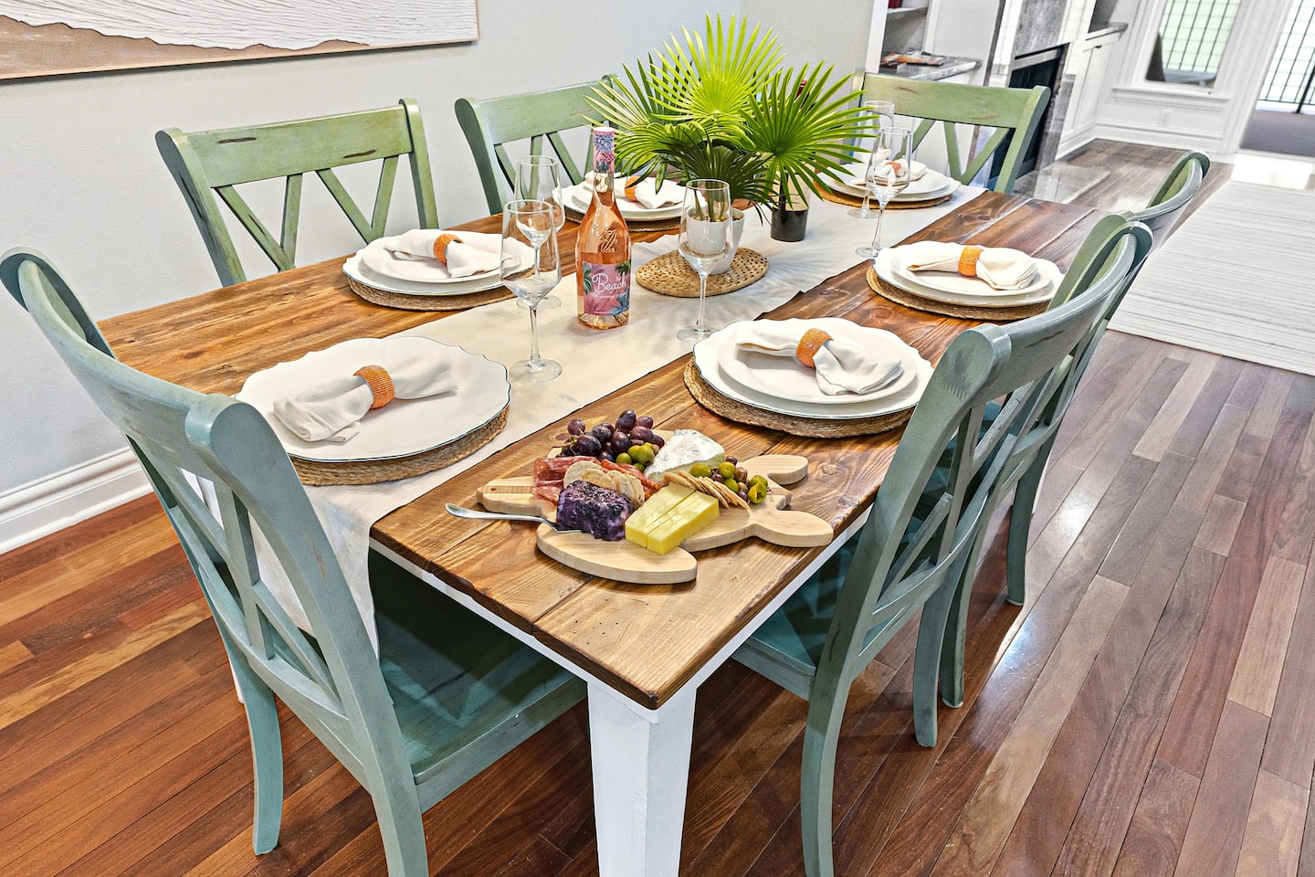Gather around for shared meals, conversations, and vacation memories. Whether it's breakfast before the beach or a relaxed evening with wine and charcuterie, this dining space was designed for bringing everyone together.