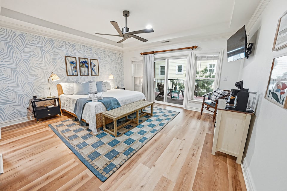 King master suite with private balcony access and an in-room coffee station
