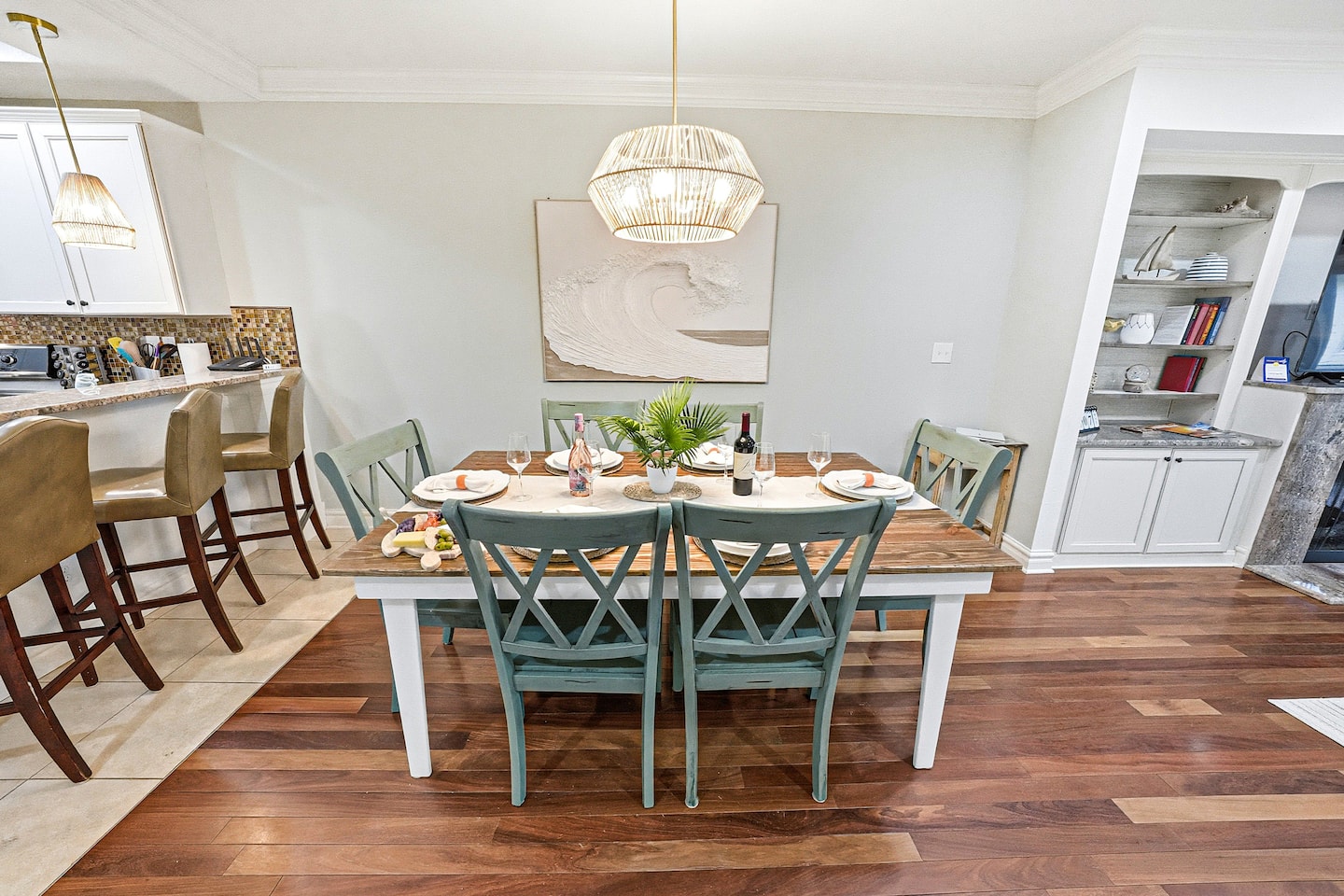 Designed for gathering, this open dining space is the perfect place to enjoy family meals, game nights, and conversations that continue long after a day at the beach.