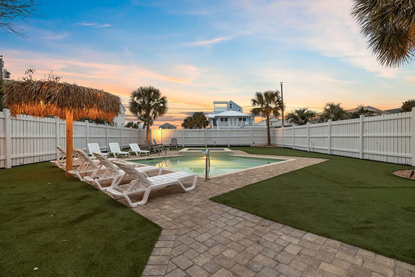 Stay out past sunset as the pool lights come up. The night everyone remembers happens right here in the backyard.