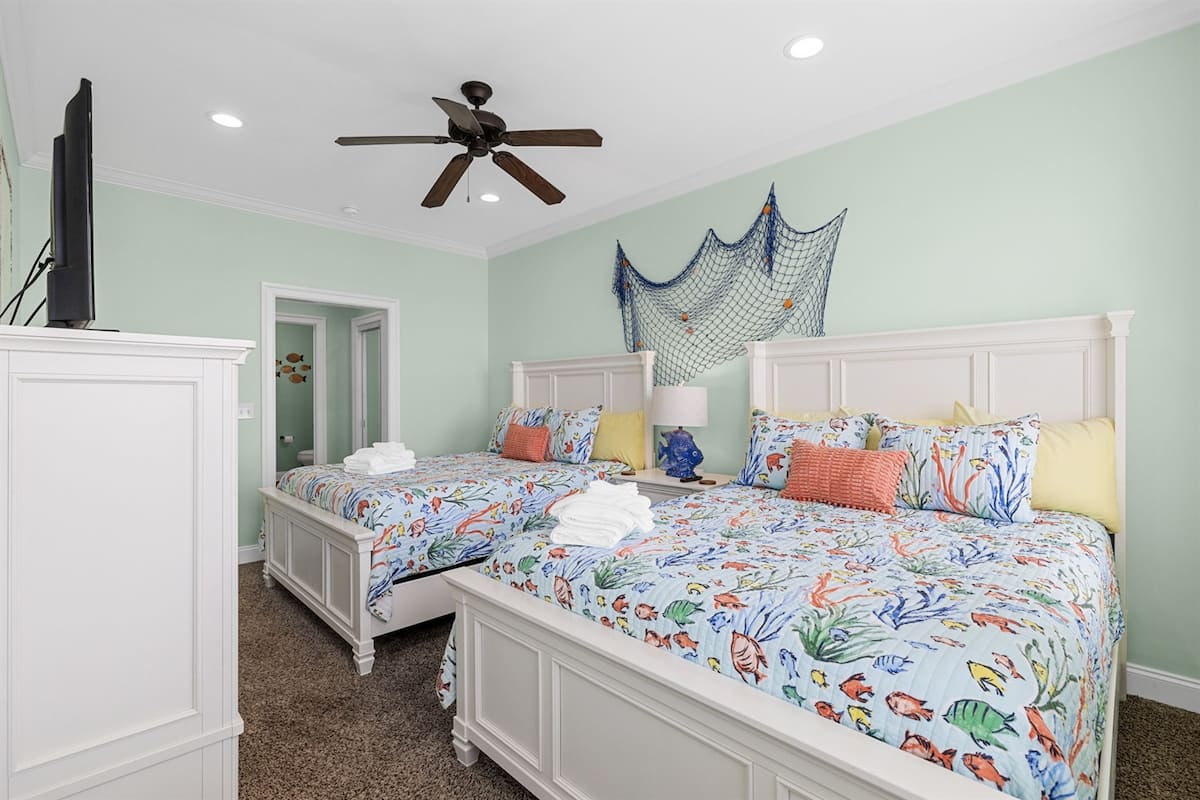 Bunk the cousins together in the two-queen suite with its own bath. Four sleep easy without negotiating.