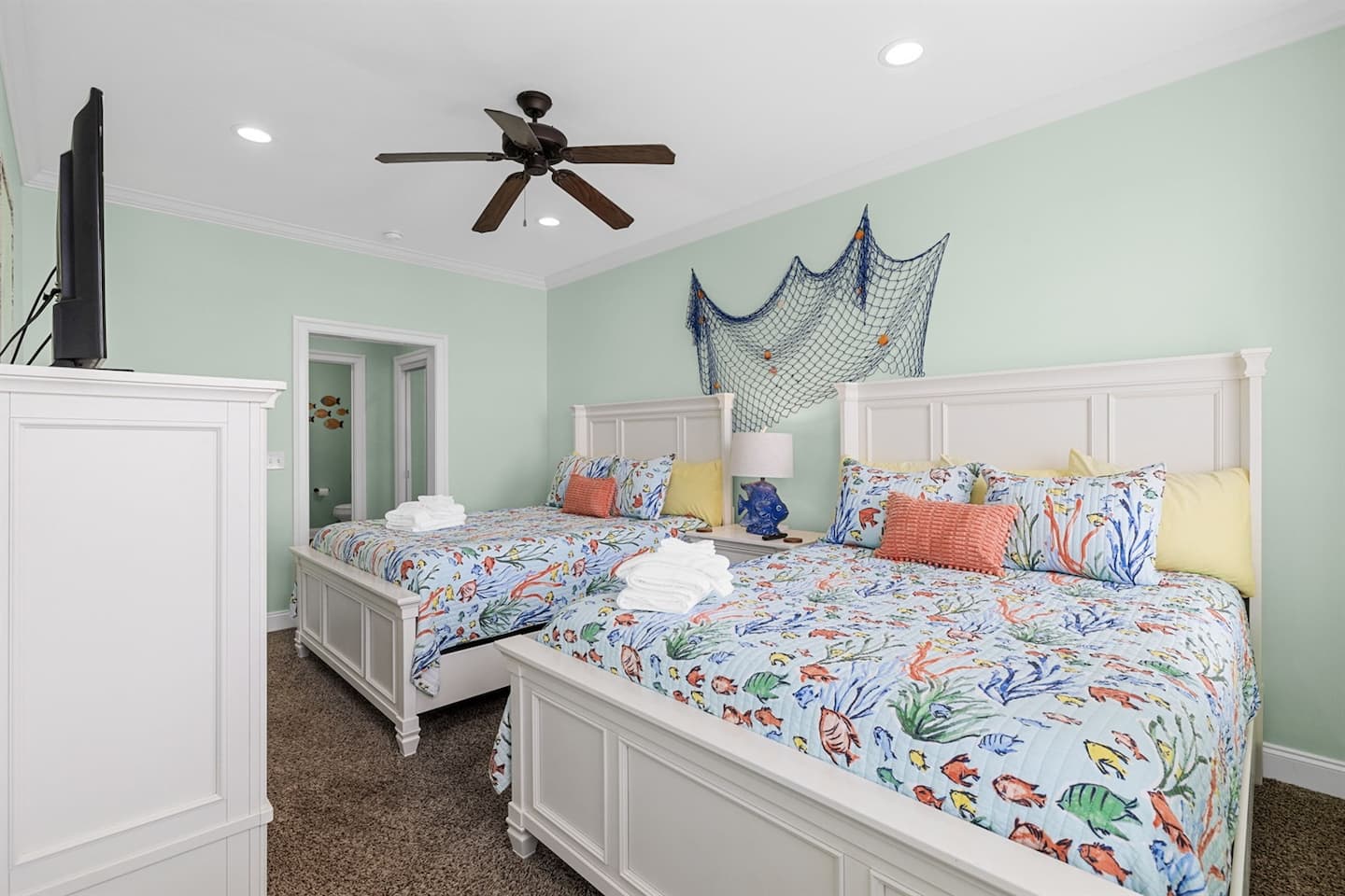 Bunk the cousins together in the two-queen suite with its own bath. Four sleep easy without negotiating.
