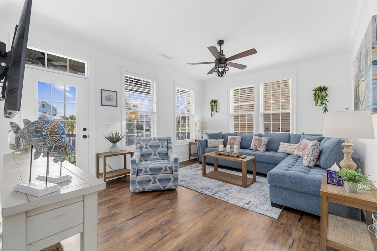 Step inside to the room where everyone naturally collects. Open, bright, and built for a crowd.