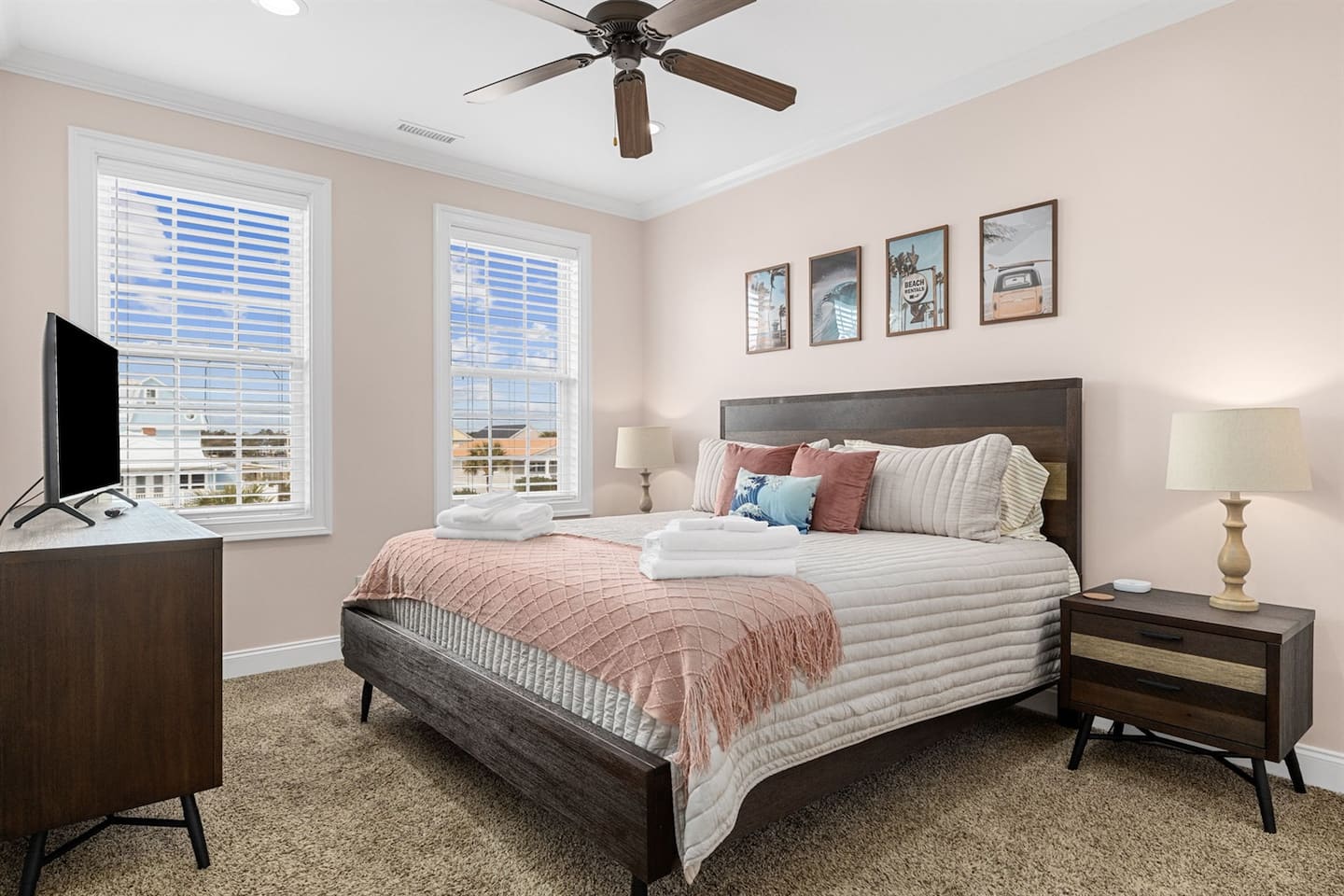 Claim the second-floor king suite for a couple's room that still feels like a getaway inside the group house.