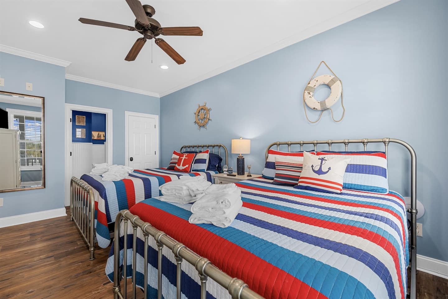 Drop your bags in the main-floor suite with two queens. The easy room for grandparents or anyone skipping the stairs.