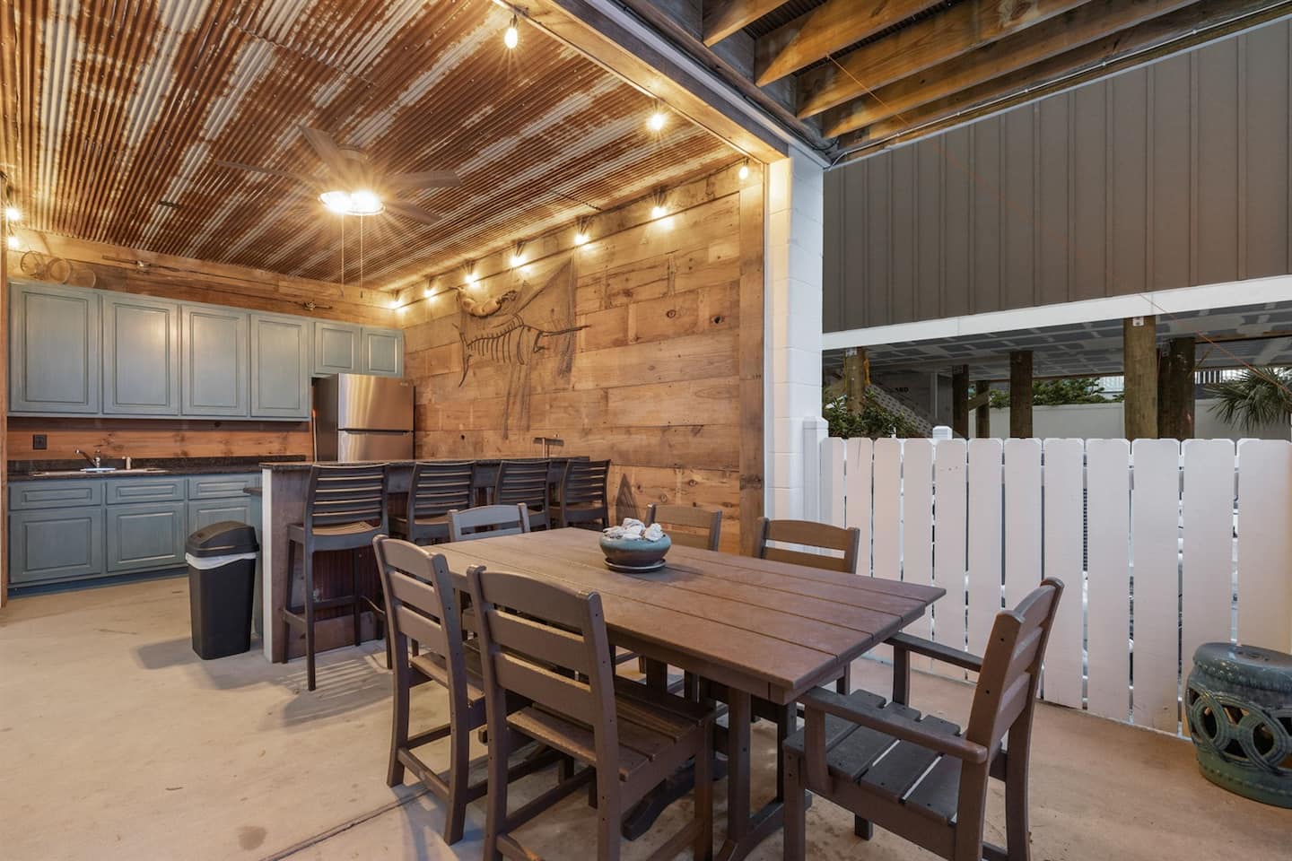 Pull up to a house that looks exactly like a beach house should. Lived-in character, not a cookie-cutter rental.