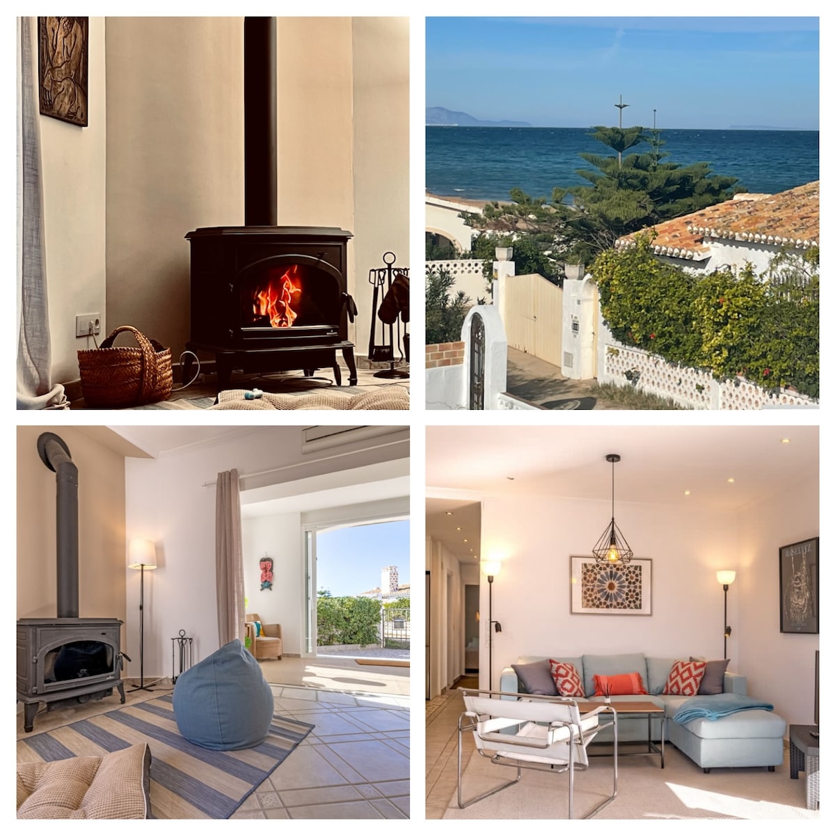 A cozy living area features a fireplace with a decorative basket beside it. Natural light floods the space through large windows, highlighting the neutral-toned furnishings and soft textiles. The adjacent view captures the serene coastline, with the ocean visible in the background.