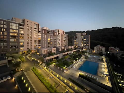 Apartment in Tilal Fanar, Terrace,wifi,gym,parking
