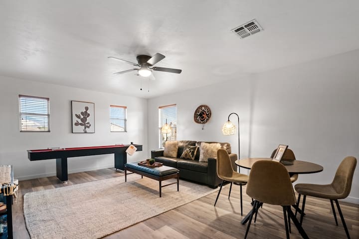 This bright second-floor living area offers a relaxed, casual space to unwind. With warm natural light and plenty of room to lounge, it's an inviting spot to recharge between your Tucson adventures.